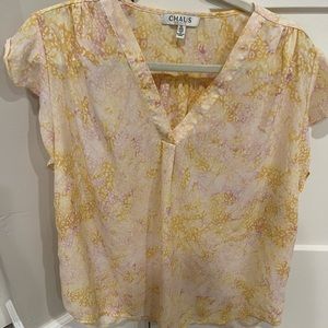 Yellow sleeveless blouse